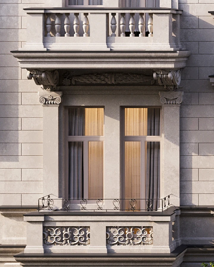 Balcony on floor 2 with a wrought-iron railing and a balustrade above the window